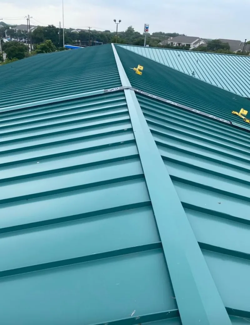 Green commercial metal roof ridge and valley for Metal Roof Repair in Winter Springs